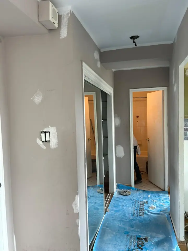 Hallway protected with tarps