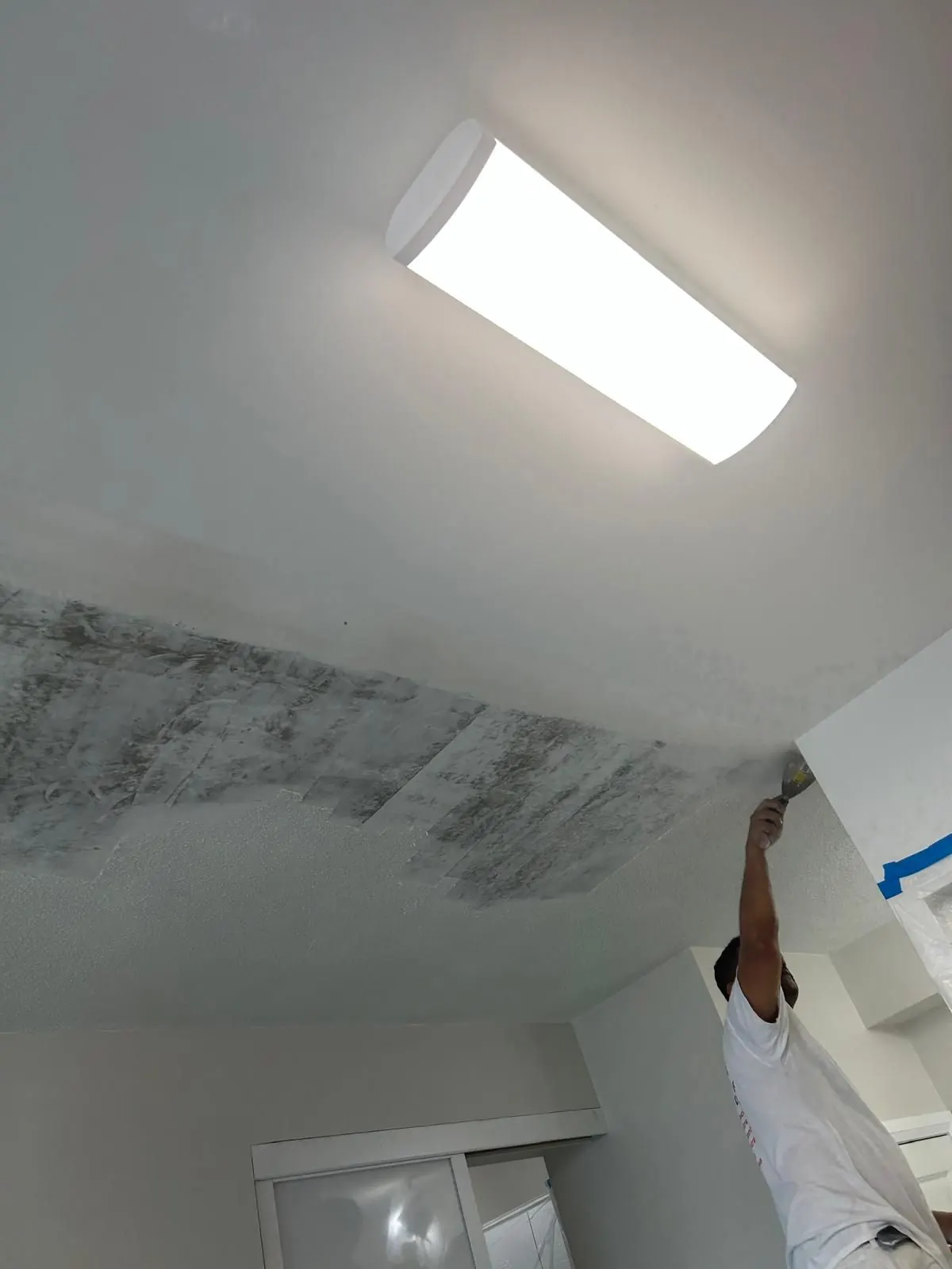 Cutting in the ceiling by hand