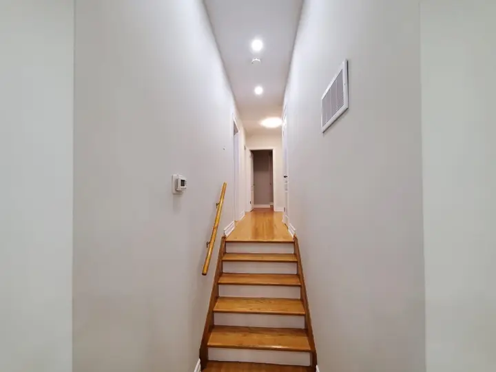 Long hallway up to the second floor