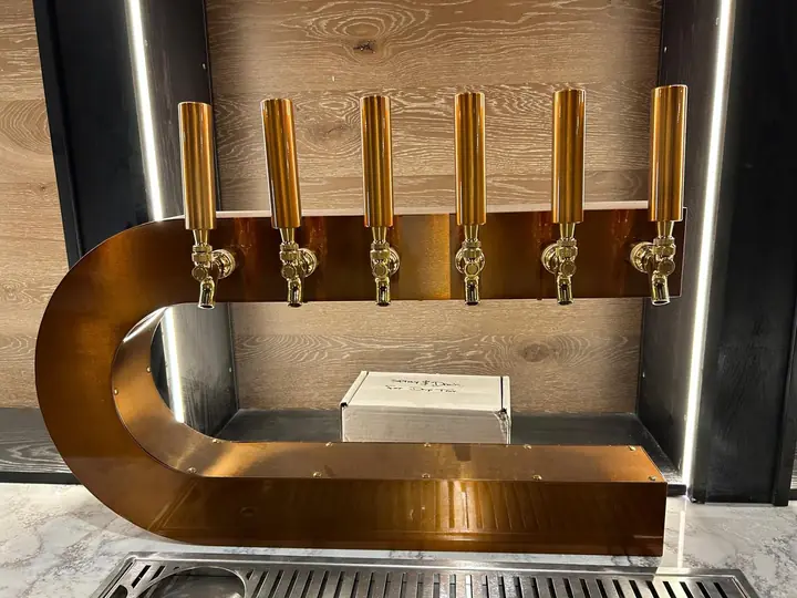 Bar with brass taps