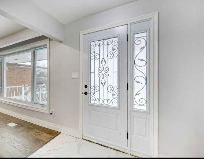 Hallway door with wrought-iron detail